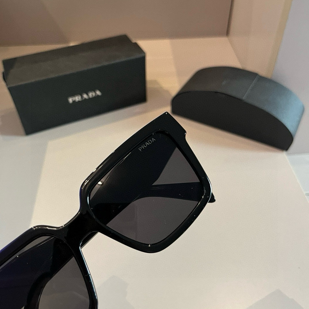 Prada High-End Women’s Sunglasses – Face-Shaping UV Protection