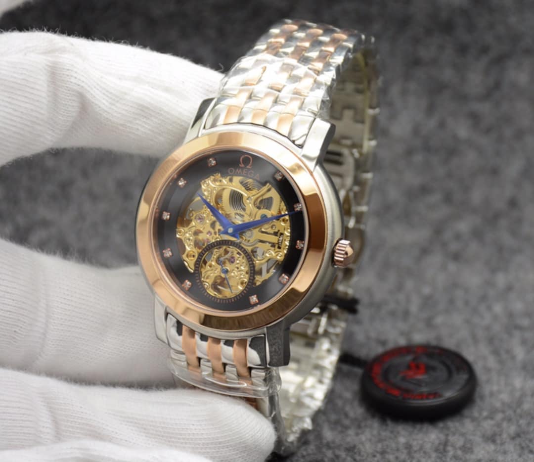 Omega Women's Gold/Silver Watch